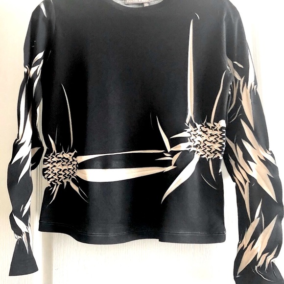 tristan and izue Tops - Great funky and stylish top.  amazing.  Details